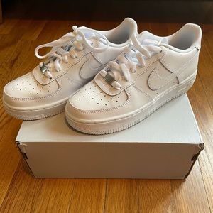 All white Air Force ones Nikes
